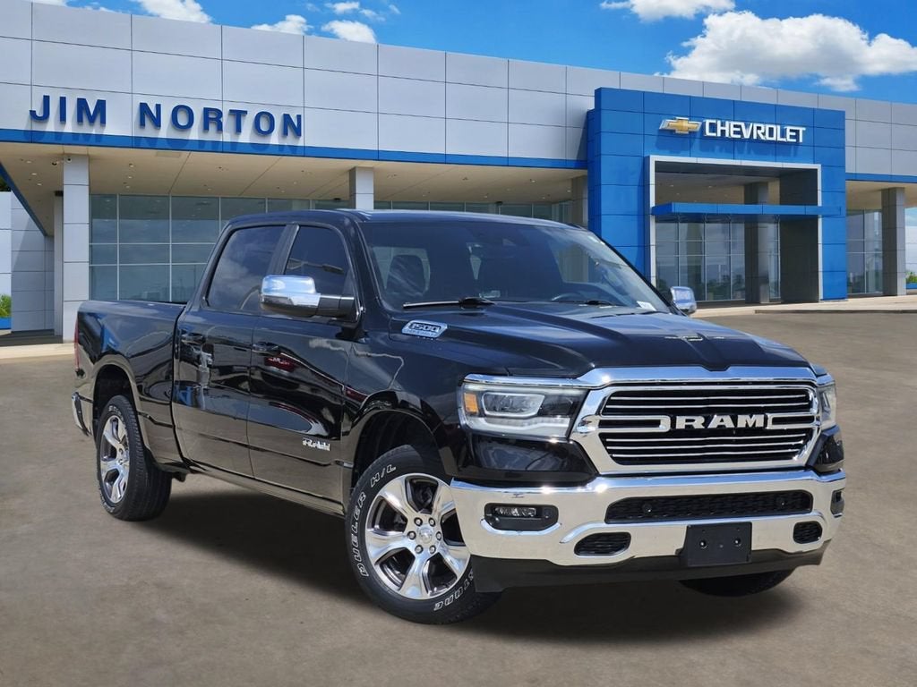2024 RAM 1500 Laramie in Black — front three-quarter view