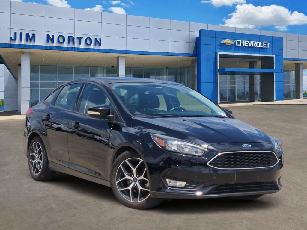 2017 Ford Focus SEL in Black — front three-quarter view
