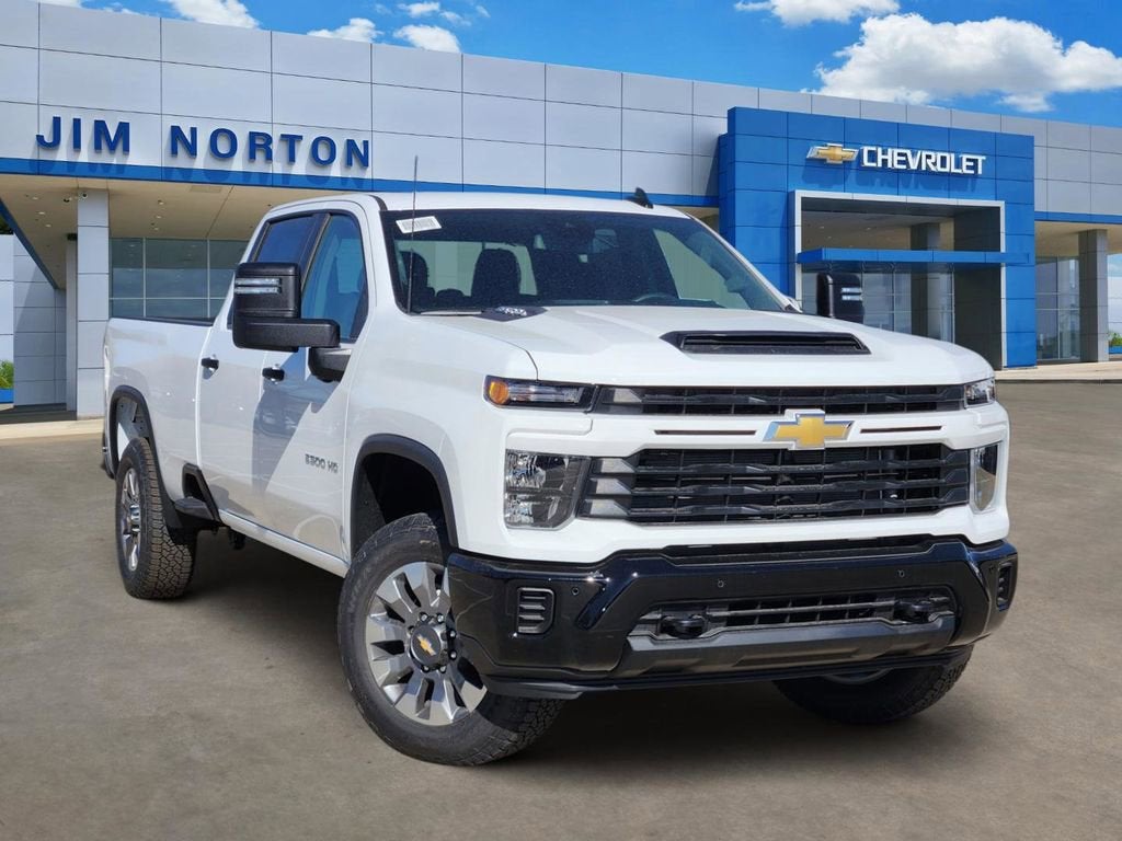 2026 Chevrolet Silverado 2500 HD Custom in Summit White — front three-quarter view