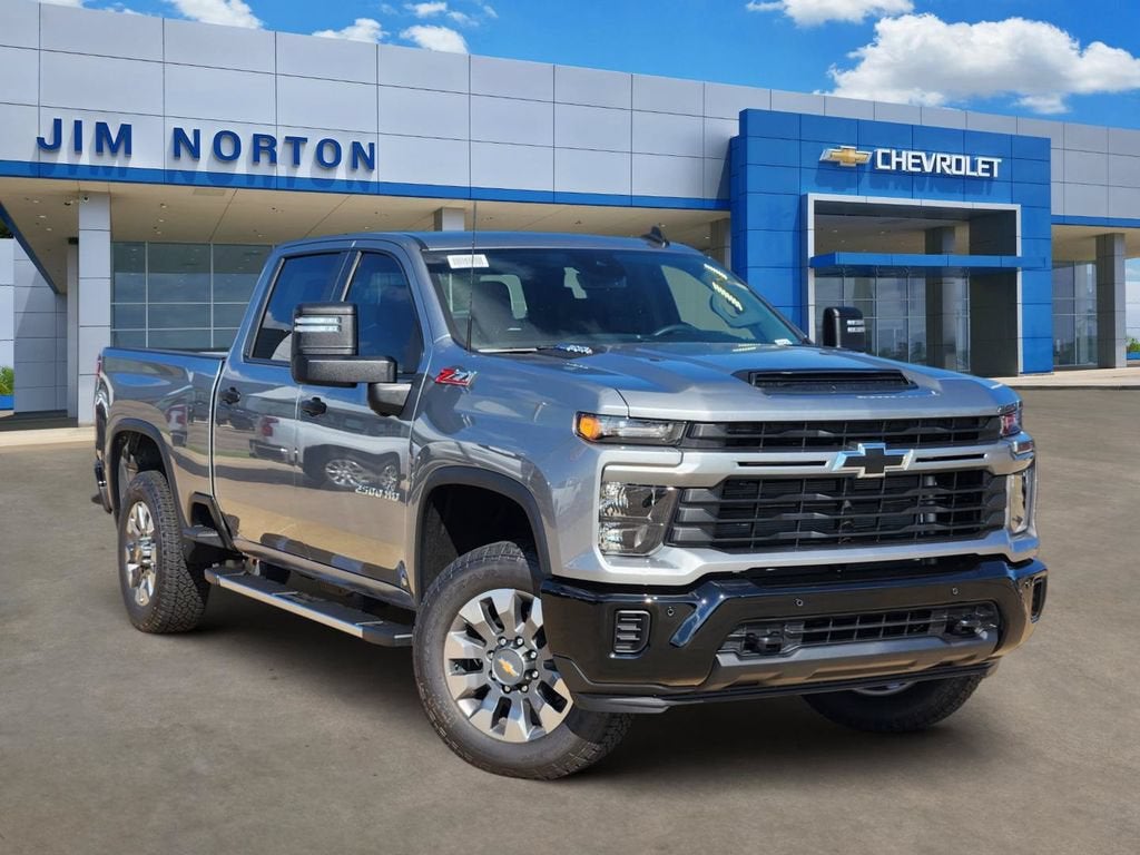 2026 Chevrolet Silverado 2500 HD Custom in Sterling Gray Metallic — front three-quarter view