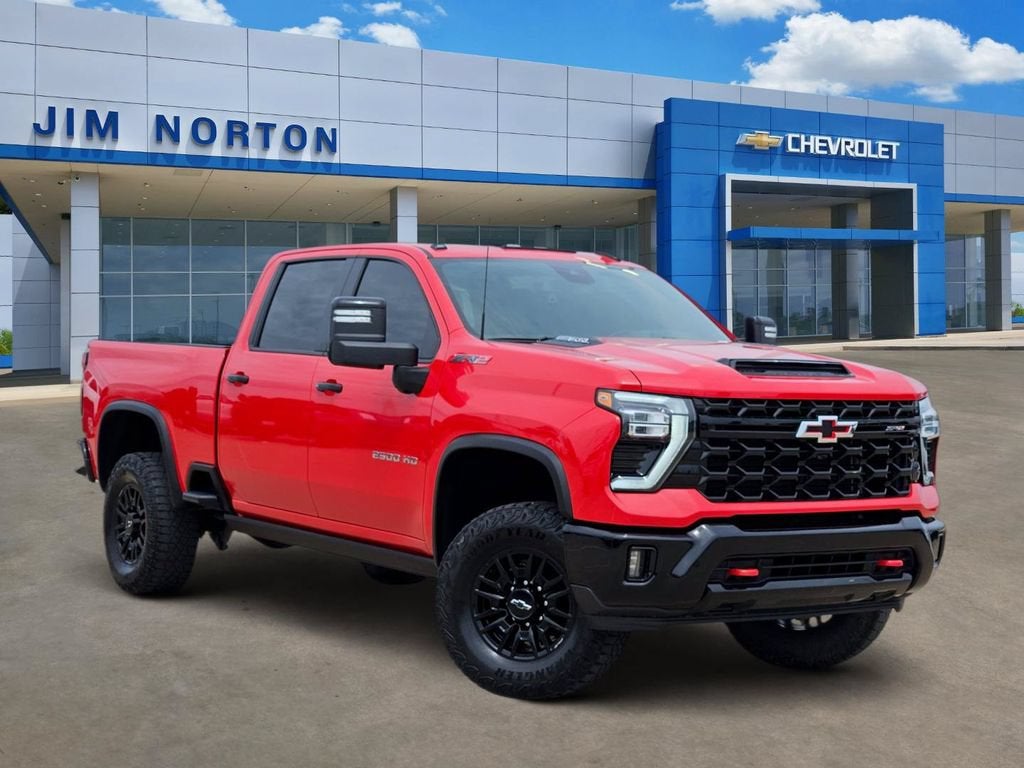 2024 Chevrolet Silverado 2500 HD ZR2 in Red Hot — front three-quarter view