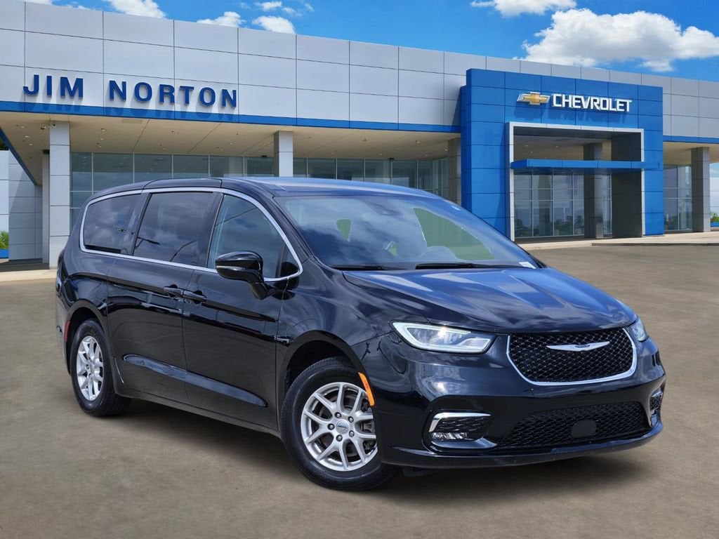 2024 Chrysler Pacifica Touring in Black — front three-quarter view