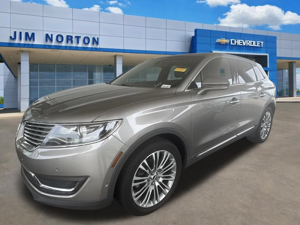 2016 Lincoln MKX Reserve in Beige — front three-quarter view