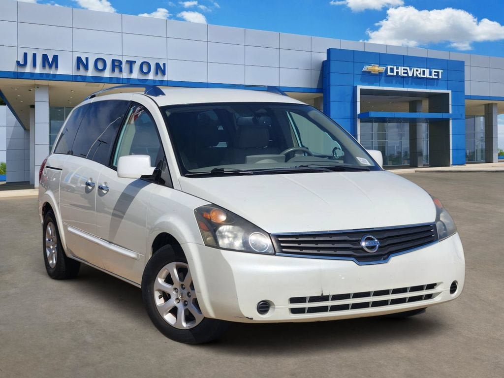 2009 Nissan Quest SL in White — front three-quarter view